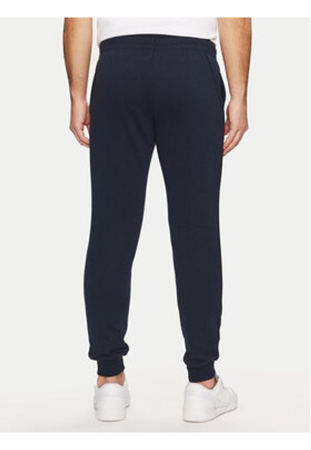 Jack & Jones - Jack&Jones Spodnie dresowe Gordon 12268442 Granatowy Regular Fit. Kolor: niebieski. Materiał: bawełna, syntetyk