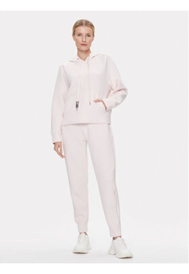 Guess Spodnie dresowe Logo W4RB46 KBYE2 Różowy Regular Fit. Kolor: różowy. Materiał: wiskoza, syntetyk