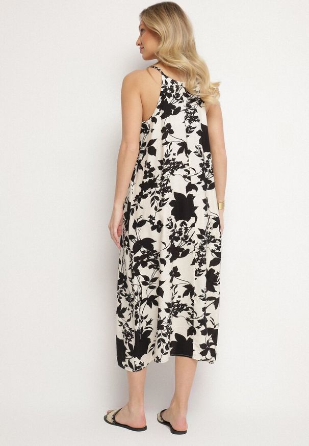 Born2be - Kremowo-Czarna Rozkloszowana Sukienka z Wiskozą w Kwiatowy Wzór Juliade. Okazja: na co dzień. Kolor: beżowy. Materiał: wiskoza. Długość rękawa: na ramiączkach. Wzór: kwiaty. Sezon: lato. Styl: casual, elegancki