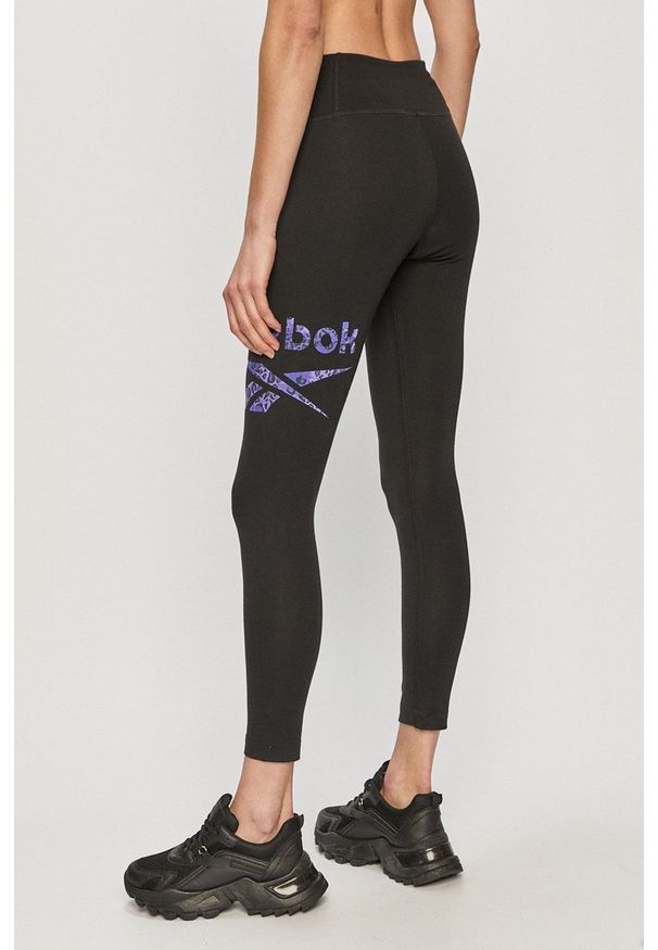 Reebok - Legginsy H23847. Stan: podwyższony. Kolor: czarny. Materiał: dzianina. Wzór: nadruk