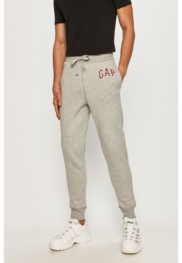 GAP - Spodnie. Okazja: na co dzień. Kolor: szary. Wzór: aplikacja. Styl: casual