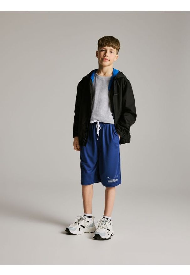 Reserved - Sportowe szorty - granatowy. Kolor: niebieski. Materiał: dzianina. Styl: sportowy