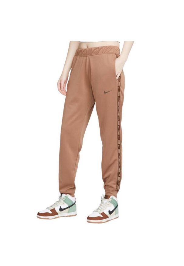 Nike - Spodnie Do Biegania Z Taśmą Dla Pań I Panów. Kolor: brązowy. Sport: fitness