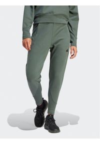 Adidas - adidas Spodnie dresowe Z.N.E. Winterized IS4333 Zielony Regular Fit. Kolor: zielony. Materiał: syntetyk #1