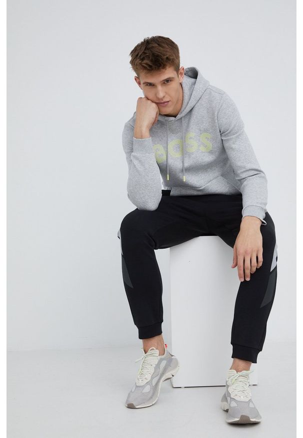 BOSS bluza BOSS ATHLEISURE męska kolor szary z kapturem z nadrukiem. Typ kołnierza: kaptur. Kolor: szary. Materiał: dzianina. Wzór: nadruk