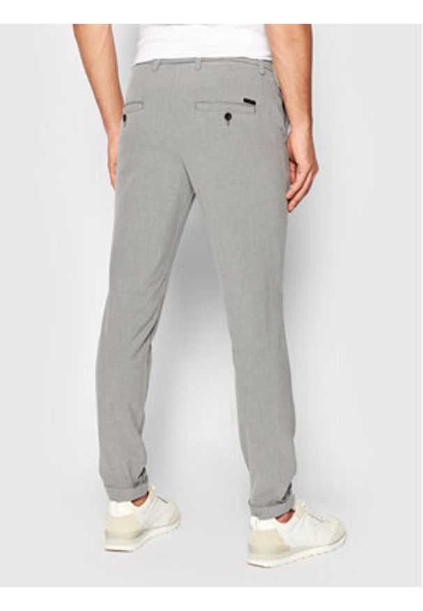 Jack & Jones Chinosy Marco 12169491 Szary Slim Fit. Kolor: szary. Materiał: syntetyk