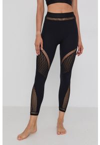 Wolford - Legginsy Shuri. Stan: podwyższony. Kolor: czarny. Materiał: dzianina #1