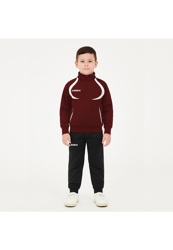 LEGEA - Komplet dresu dla chłopca ALGERIA JUNIOR JR. Okazja: na uczelnię. Kolor: czerwony, wielokolorowy, brązowy, biały. Materiał: dresówka. Styl: sportowy