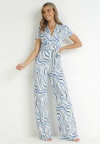 Born2be - Niebieski Kombinezon z Kopertowym Dekoltem i Materiałowym Paskiem Aenita. Kolor: niebieski. Materiał: materiał. Długość rękawa: krótki rękaw. Długość: krótkie. Sezon: wiosna, lato #4