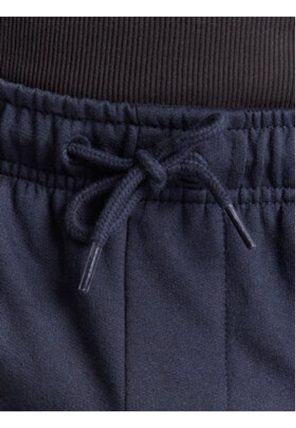 Quiksilver Spodnie dresowe Basic Jogger EQYFB03403 Granatowy Regular Fit. Kolor: niebieski. Materiał: syntetyk, bawełna