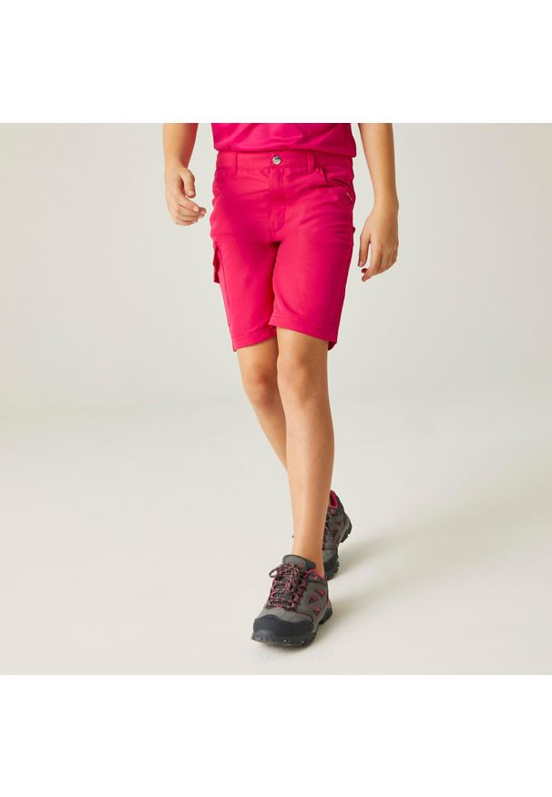 Regatta - Sorcers II dziecięce spodnie trekkingowe. Kolor: różowy. Materiał: poliester. Styl: sportowy. Sport: turystyka piesza