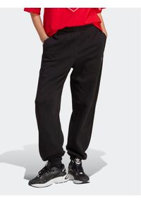 Adidas - adidas Spodnie dresowe Essentials Fleece IA6437 Czarny Regular Fit. Kolor: czarny. Materiał: bawełna, syntetyk #1