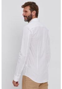 Calvin Klein Jeans Koszula męska kolor biały slim z kołnierzykiem klasycznym. Typ kołnierza: kołnierzyk klasyczny. Kolor: biały. Materiał: tkanina. Długość rękawa: długi rękaw. Długość: długie. Wzór: gładki. Styl: klasyczny