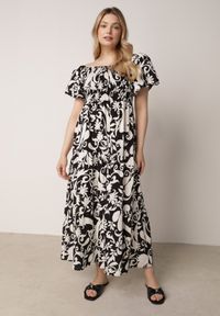 Born2be - Czarna Rozkloszowana Sukienka z Wiskozy z Bufiastymi Rękawami w Roślinny Wzór Semea. Okazja: na co dzień, do pracy, na spotkanie biznesowe. Kolor: czarny. Materiał: wiskoza. Sezon: lato. Typ sukienki: rozkloszowane, proste. Styl: casual, biznesowy. Długość: maxi #1