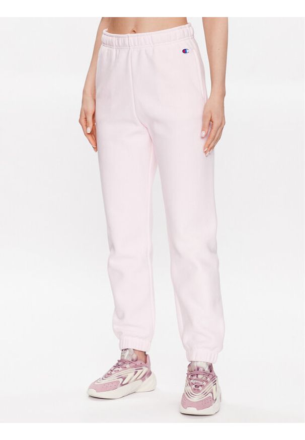 Champion Spodnie dresowe 116243 Różowy Regular Fit. Kolor: różowy. Materiał: bawełna