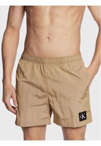 Calvin Klein Swimwear Szorty kąpielowe KM0KM00819 Beżowy Regular Fit. Kolor: beżowy. Materiał: syntetyk #1