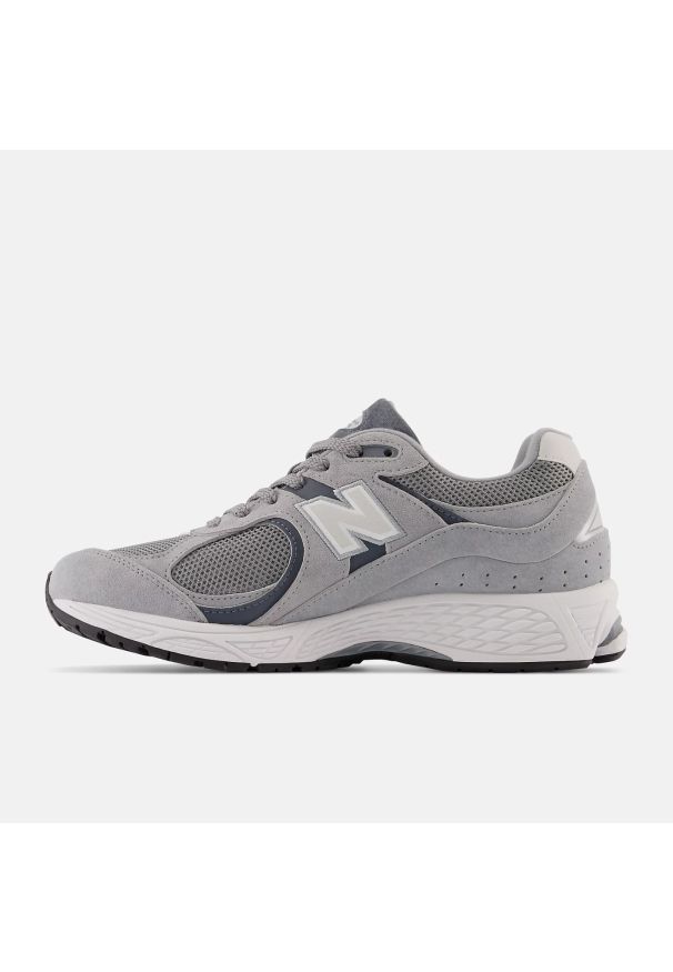 New Balance M2002RST Sneakersy unisex szary. Kolor: szary. Materiał: guma, syntetyk, materiał, skóra. Szerokość cholewki: normalna. Sport: turystyka piesza