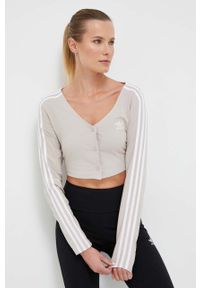 adidas Originals top damski kolor beżowy. Kolor: beżowy. Materiał: materiał, dzianina. Wzór: aplikacja #1