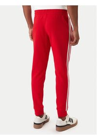 Adidas - adidas Spodnie dresowe 3-Stripes KE3560 Czerwony Slim Fit. Kolor: czerwony. Materiał: syntetyk #3