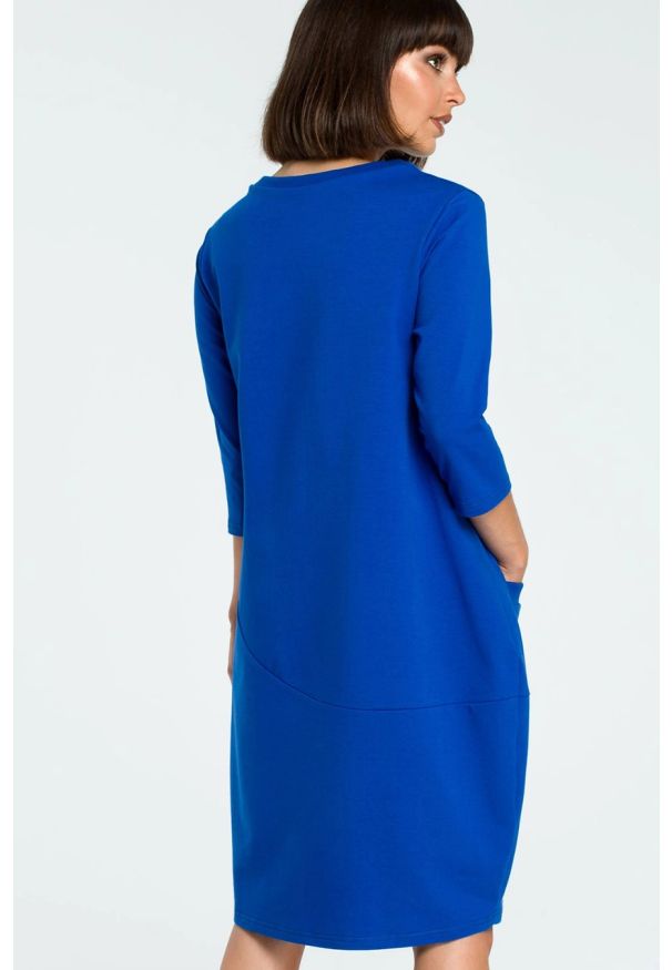 Sukienki.shop - Sukienka dresowa bombka oversize z kieszonką niebieska. Okazja: na co dzień. Kolor: niebieski, szary. Materiał: dresówka. Typ sukienki: bombki, oversize. Styl: casual