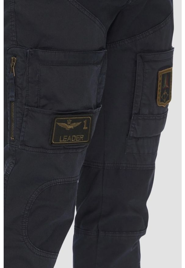 Aeronautica Militare - AERONAUTICA MILITARE Granatowe męskie bawełniane bojówki, Rozmiar 50. Okazja: na co dzień. Kolor: niebieski. Materiał: bawełna. Wzór: moro. Styl: casual, militarny