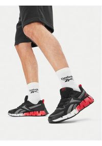 Reebok Sneakersy CEO-ZIG VECTOR AR30153M-BNR Czarny. Kolor: czarny. Materiał: materiał #4