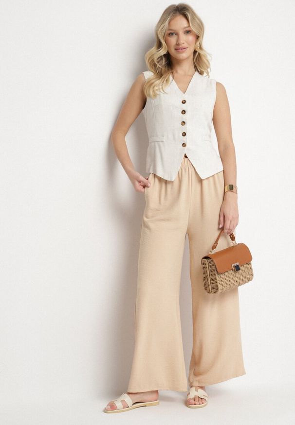 Born2be - Beżowe Spodnie Palazzo o Szerokim Kroju z Wysokim Stanem Aravenna. Okazja: na co dzień. Stan: podwyższony. Kolor: beżowy. Wzór: aplikacja. Styl: elegancki, casual