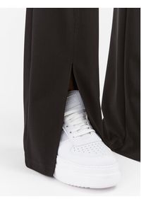 Calvin Klein Jeans Spodnie materiałowe J20J222332 Czarny Relaxed Fit. Kolor: czarny. Materiał: syntetyk