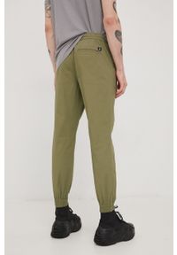 Tom Tailor spodnie męskie kolor zielony joggery. Kolor: zielony. Materiał: tkanina, bawełna