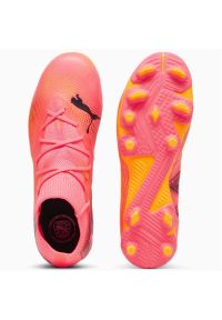 Buty piłkarskie Puma Future 7 Match FG/AG Jr 107729-03 różowe. Kolor: różowy. Materiał: dzianina, syntetyk. Szerokość cholewki: normalna. Sport: piłka nożna