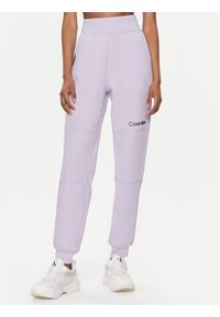 Calvin Klein Performance Spodnie dresowe 00GWF3P636 Fioletowy Relaxed Fit. Kolor: fioletowy. Materiał: syntetyk