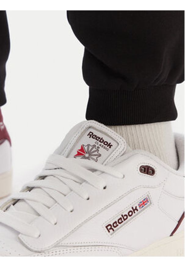 Reebok Spodnie dresowe Winslow RK25140CCM Czarny Regular Fit. Kolor: czarny. Materiał: bawełna