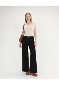 Unisono - Jeansy z szerokimi nogawkami. Materiał: jeans. Długość: długie. Styl: klasyczny #3