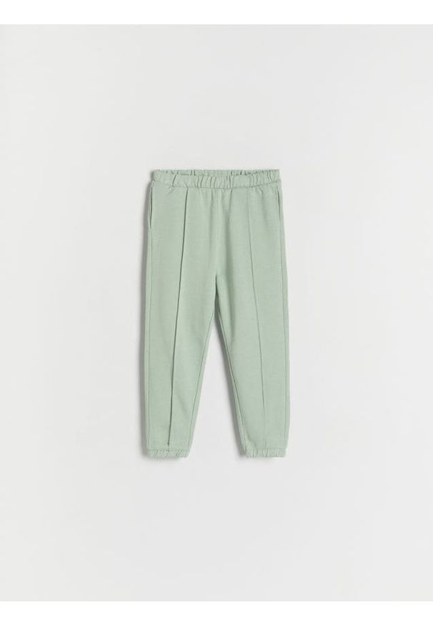 Reserved - Spodnie dresowe - jasnozielony. Kolor: zielony. Materiał: dresówka