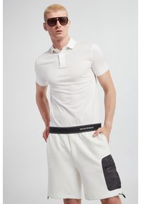 Emporio Armani - Polo męskie EMPORIO ARMANI. Typ kołnierza: polo