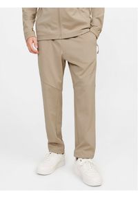Jack & Jones - Jack&Jones Spodnie dresowe Will 12253727 Beżowy Slim Fit. Kolor: beżowy. Materiał: syntetyk #1