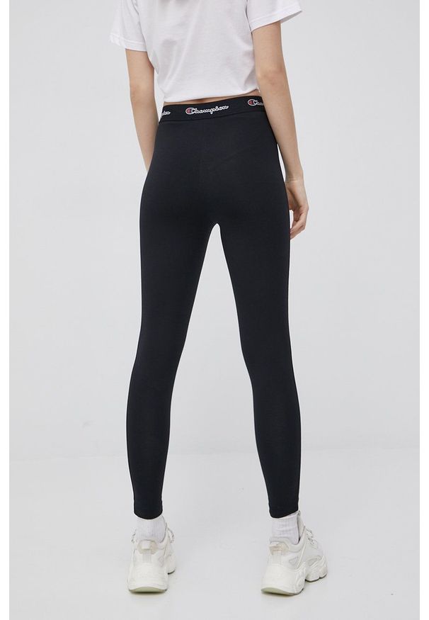 Champion legginsy damskie kolor czarny gładkie. Kolor: czarny. Materiał: dzianina, włókno. Wzór: gładki