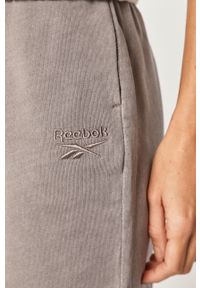 Reebok Classic - Spodnie. Kolor: fioletowy. Materiał: bawełna, materiał, dzianina, elastan. Wzór: gładki #3