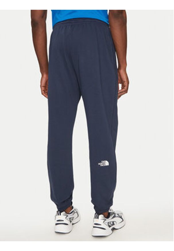 The North Face Spodnie dresowe Simple Dome Light NF0A8C41 Granatowy Regular Fit. Kolor: niebieski. Materiał: bawełna