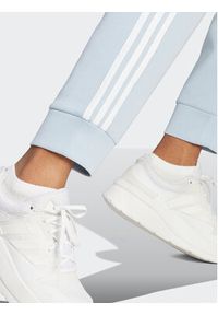 Adidas - adidas Spodnie dresowe Future Icons 3-Stripes IM2545 Błękitny Regular Fit. Kolor: niebieski. Materiał: bawełna #5