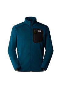 Bluza The North Face Crest 0A897C5LO1 - niebieskie. Kolor: niebieski. Materiał: elastan, dzianina, polar, materiał, poliester. Długość rękawa: długi rękaw. Długość: długie. Styl: klasyczny