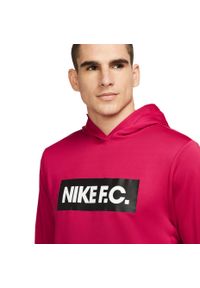 Bluza sportowa męska Nike FC Libero Dri-Fit treningowa kangurka z kapturem. Typ kołnierza: kaptur. Kolor: różowy. Materiał: dresówka. Technologia: Dri-Fit (Nike)