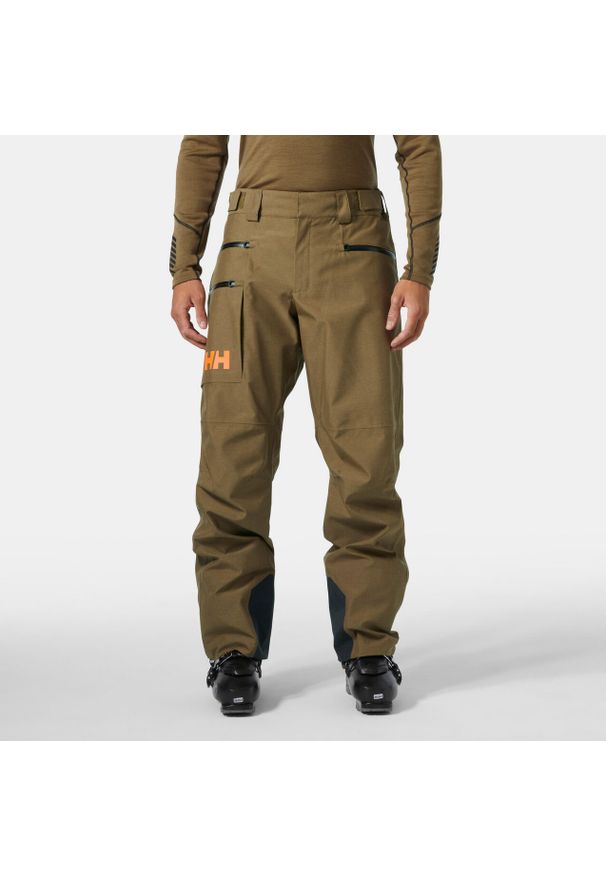 Spodnie narciarskie Helly Hansen Garibaldi 2.0. Kolor: brązowy, beżowy, wielokolorowy. Sezon: zima. Sport: narciarstwo