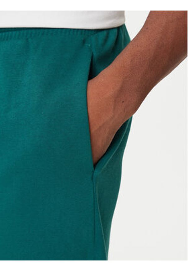 Adidas - adidas Spodnie dresowe Collegiate JM9178 Zielony Regular Fit. Kolor: zielony. Materiał: syntetyk, bawełna
