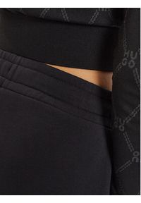Hugo Spodnie dresowe 50528471 Czarny Relaxed Fit. Kolor: czarny. Materiał: bawełna