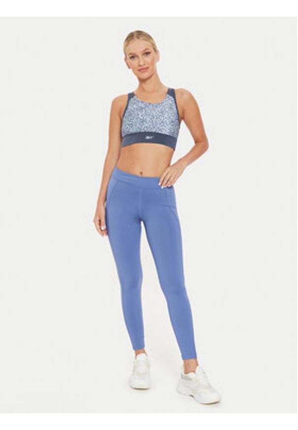 Reebok Biustonosz top Running AOP 100076052 Szary Regular Fit. Kolor: szary. Materiał: syntetyk. Sport: bieganie