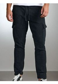 Sinsay - Spodnie tapered fit cargo - niebieski. Kolor: niebieski