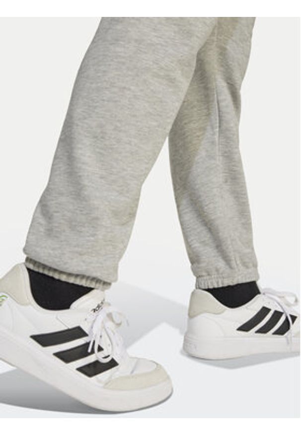 Adidas - adidas Spodnie dresowe Essentials JD2092 Szary Regular Fit. Kolor: szary. Materiał: bawełna