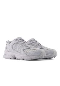 New Balance 530 U530TBA Sneakersy unisex. Okazja: na co dzień, do pracy, na spacer, na uczelnię. Kolor: szary. Materiał: guma, syntetyk, skóra. Szerokość cholewki: normalna. Sezon: lato. Sport: turystyka piesza