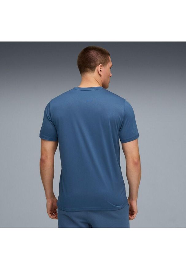 Puma - Męska jednokolorowa koszulka TAD ESSENTIALS z logo Cat PUMA. Kolor: niebieski. Materiał: materiał. Sport: fitness